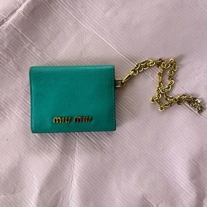 MiuMiu wallet with a chain